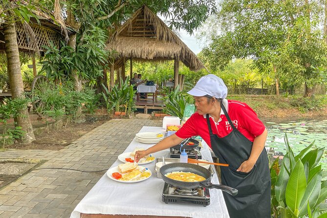 Angkor Sunrise Vespa Tour / Tuk Tuk or Car - Ta Prohm with Tomb Raider energy: trees, roots, and crumbling towers