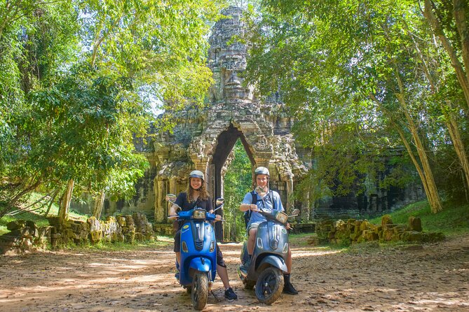 Angkor Sunrise Vespa Tour / Tuk Tuk or Car - Angkor Wat at sunrise: walking the carvings in the morning light
