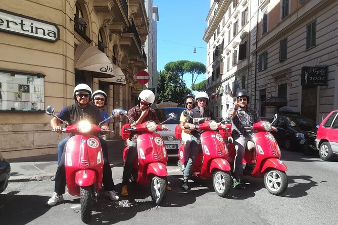 Beautiful Roma Tour on Vespa with Driver - Via dei Fori Imperiali and an Ancient Roman Entertainment Setting