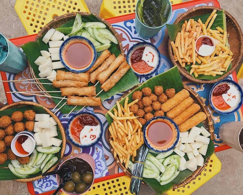 Enjoy Hanoi Like a Local - Vespa & Street Food Tour by Night - Entering Hanoi After Dark on a Vintage Vespa