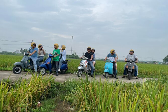 Exploring Vespa Tour Through Little Red River Delta - Hanoi Opera House: a classic photo stop that also helps you orient