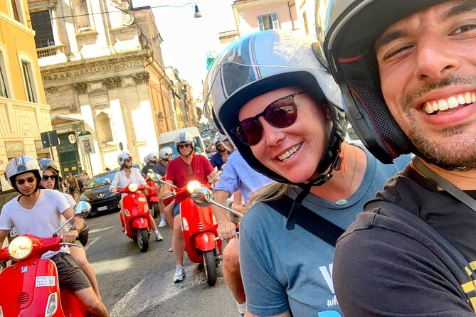 Guided Vespa Tour of Rome – Ride a Vespa with a Local Guide - Stop 1: Colosseum photo moment with the story setup