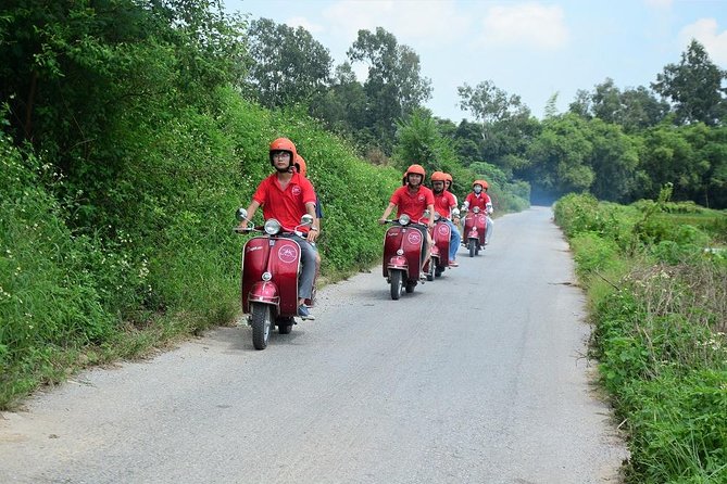 Hanoi Back Street Vespa Tours: Full Day Vespa Tours - Getting set up on a vintage Vespa in Hanoi