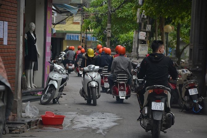 Hanoi Back Streets Vespa Tours: Hanoi Insider Vintage Vespa Tour - Huu Tiep Lake, the downed B-52, and the market stop that adds real texture