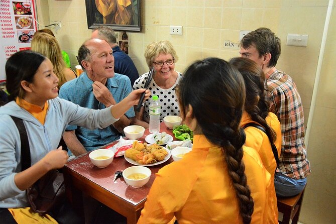 Hanoi Vespa Food Tours Led By Women - West Lake area: lantern-and-lights scenery plus a food rhythm