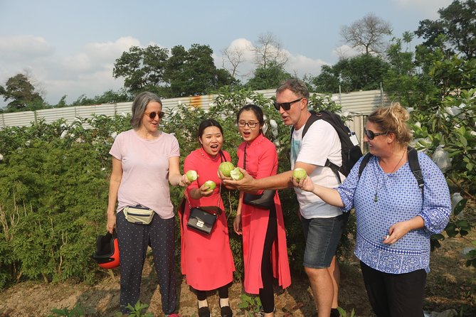 Hanoi Vespa Full Day City & Countryside with Female Ao Dai Riders - West Lake, botanical garden pass, and Huu Hiep Lake’s B-52 crash site