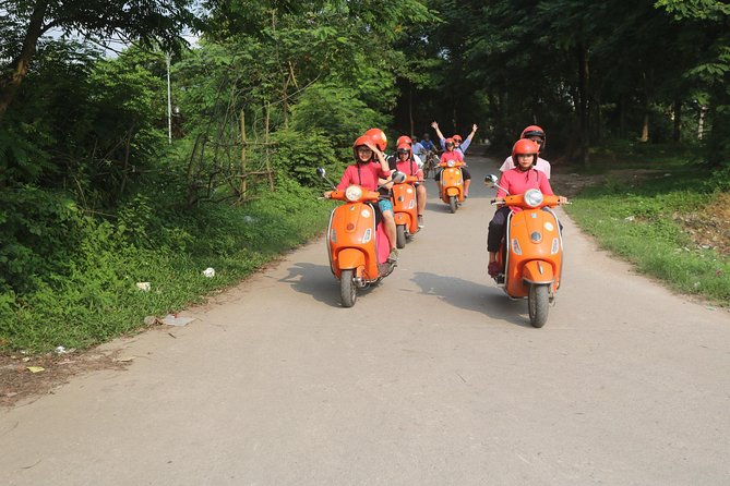 Hanoi Vespa Full Day City & Countryside with Female Ao Dai Riders - Duờng Tau railway tracks: living close to the rail line