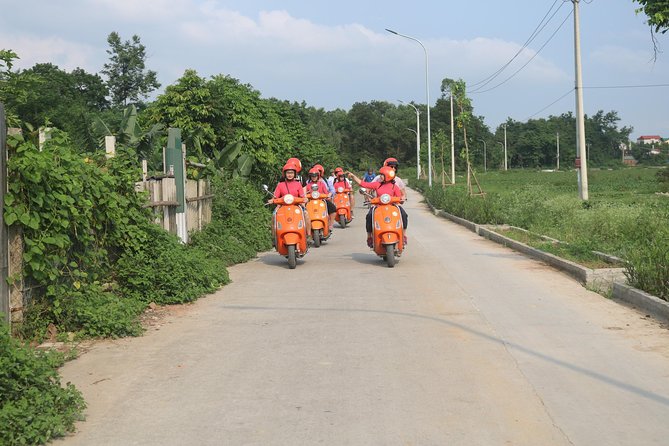Hanoi Vespa Full Day City & Countryside with Female Ao Dai Riders - Ba Đình Square area and An Dương Market: the everyday Hanoi food rhythm
