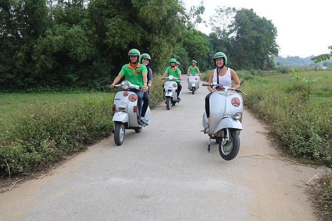 Hanoi Vespa Tour Explore Red River Delta & Rural Villages 5 Hours - Long Bien Bridge stop: an old Hanoi landmark from the middle