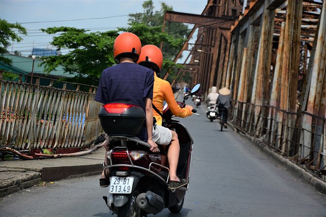 Hanoi Vespa Tours Led By Women: Hanoi City Vespa Tours - Duờng Tau, the 150-year-old rails, and life next to the train
