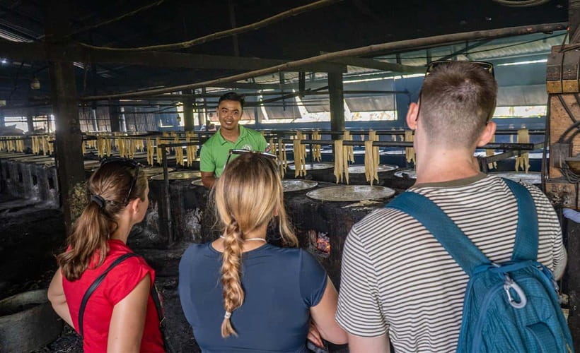 Phnom Penh Silk Island Haft Day Tour - Top Rating Experience - Mongkol Serey Temple: a guided look at belief before the markets
