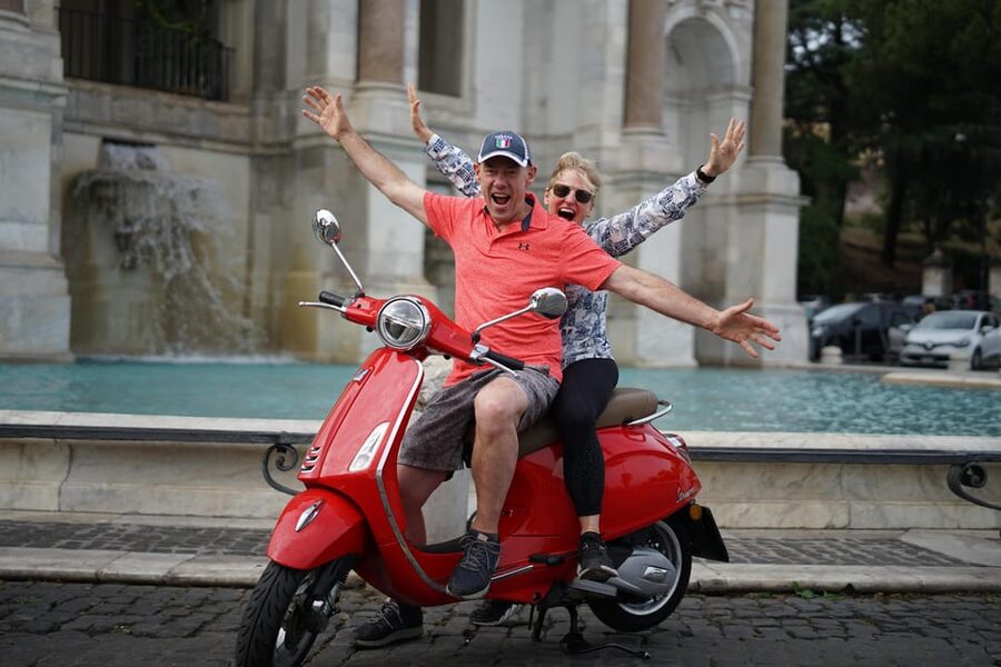 Rome: Guided Vespa Experience with Professional Photoshoot - Meeting near the Colosseum: helmets, scooters, and a smooth start