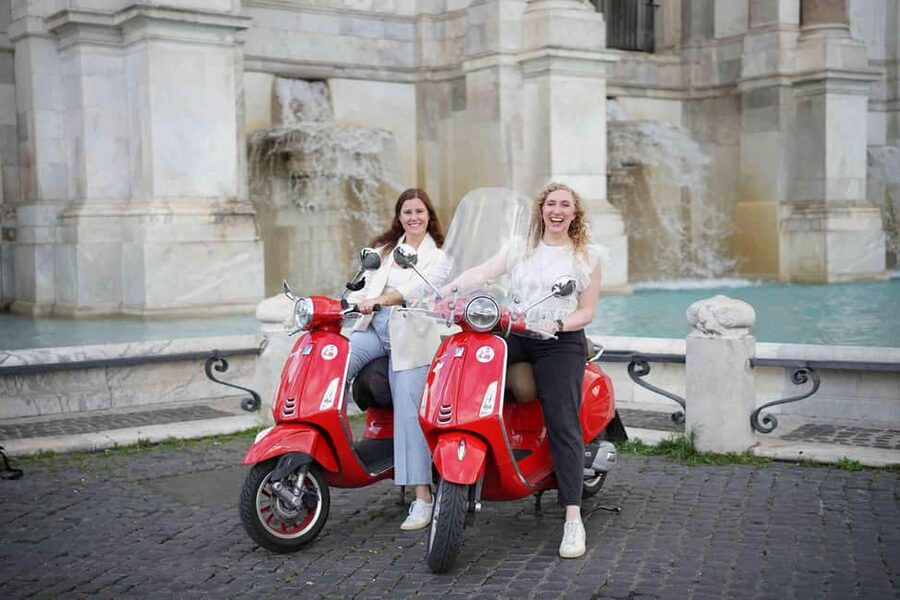 Rome: Vespa Photo Tour with City Center Pickup - Colosseum photo stop: iconic views with a plan