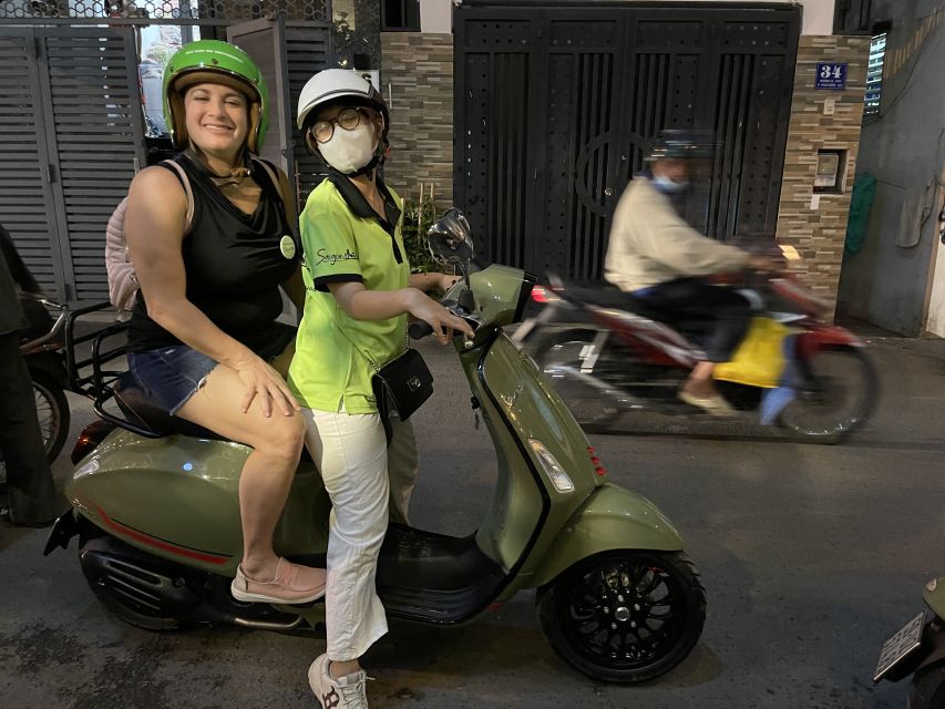 Saigon: Night Craft Beer And Street Food Tour By Vespa - Rooftop sunset stop: your first beer and the best kind of arrival