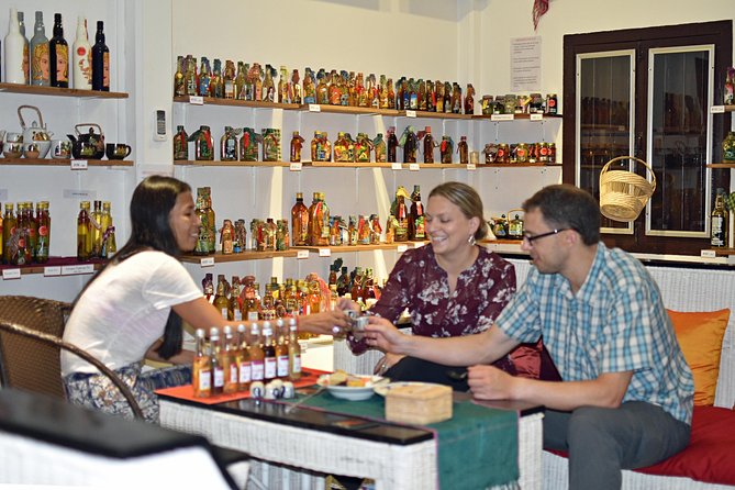 Siem Reap Food Tour by Vespa - Stop 1: Sombai Liqueur and Souvenirs (1 Hour of Flavor Education)