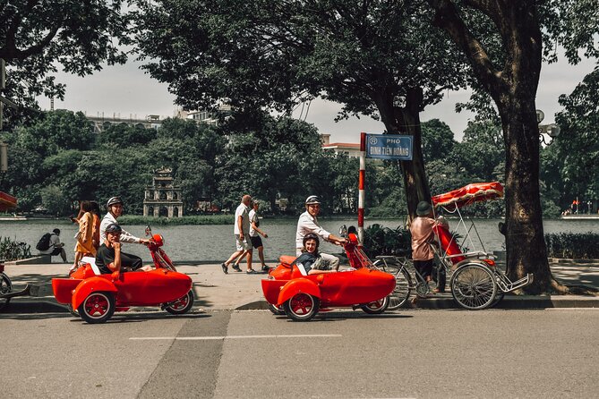 Small Group Vespa Sidecar Tour in Hanoi - Hang Bac Temple: the easy start and fast orientation photos