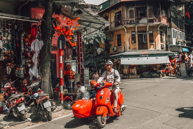 Vespa Sidecar Sightseeing and Cuisine Tour in Hanoi - Getting There: Meeting Point, Pickup, and How the Tour Runs