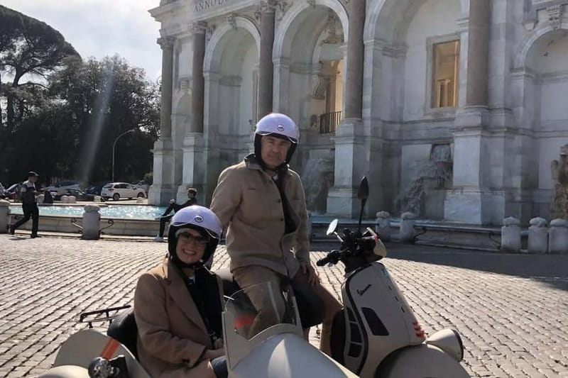 Vespa Sidecar Tour: Express Highlights of Rome - Colosseum area stop: iconic views, no inside-ticket pressure