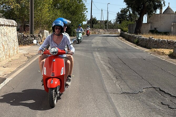 Vespa tour from Polignano to Savelletri with octopus sandwich - Monopoli’s historic center and harbor walk